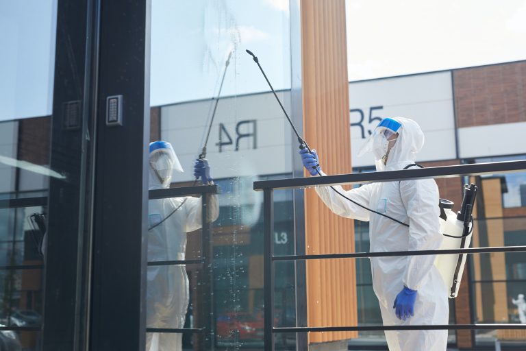 Worker Cleaning Glass Window